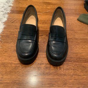 Black leather loafers